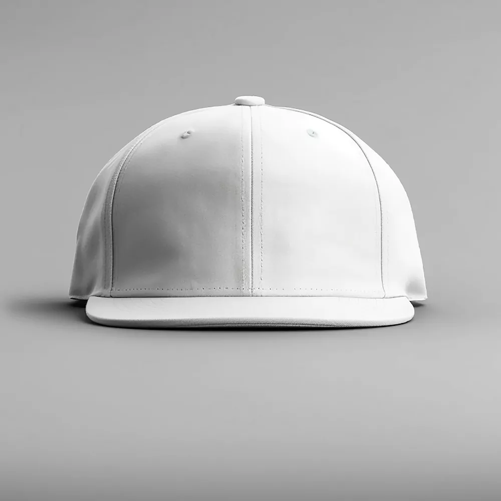 A plain white baseball cap on a grey studio background