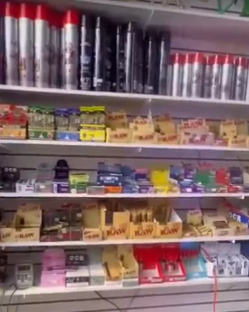 Rolling papers and lighter refills on the back wall
